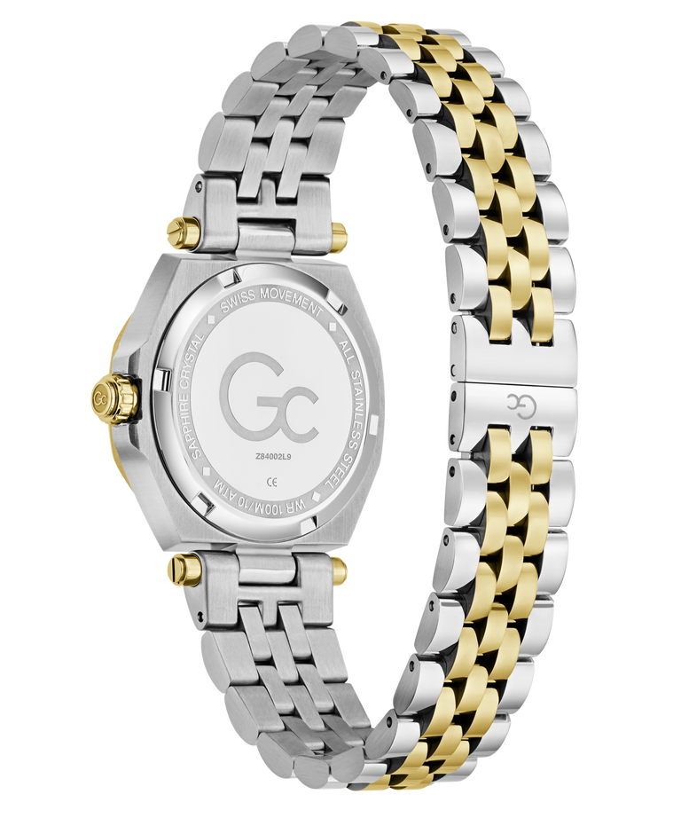 A two-tone stainless steel and gold wristwatch shown from the back, featuring a silver-toned case, white crystal, and a matching two-tone link bracelet with silver and gold segments.