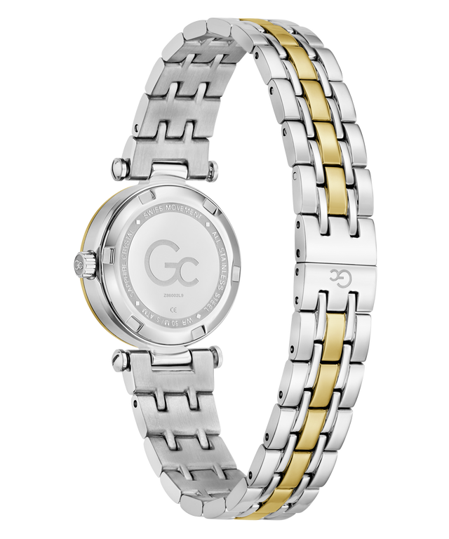 A women's two-tone stainless steel watch with a gold-plated center links, shown from the back of the case. The silver-tone case back features a monogram logo 'GC' and 'GEMMA' printed on it, set against a clean white background.
