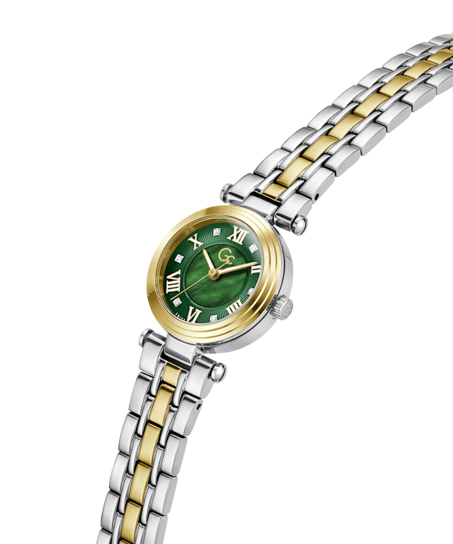 A women's two-tone watch with a green dial, gold-tone bezel and hands, and a silver-and-gold two-tone stainless steel link bracelet, shown on a plain white background. lifestyle