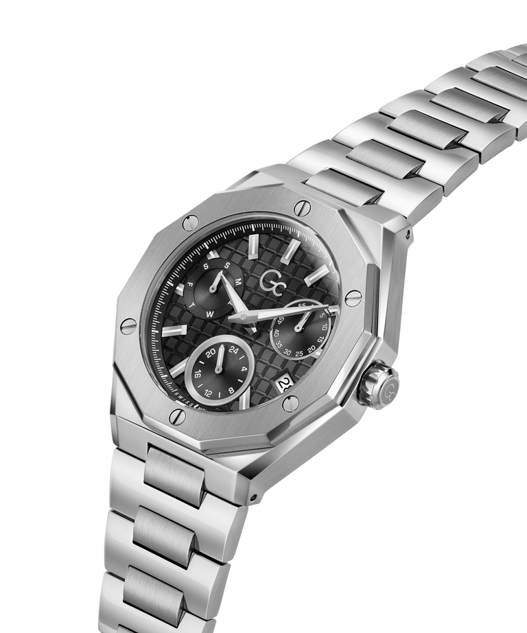A silver-toned stainless steel wristwatch with an octagonal bezel, a dark textured dial featuring three subdials, and a matching steel link bracelet, shown on a plain white background. lifestyle