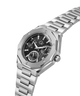 A silver-toned stainless steel wristwatch with an octagonal bezel, a dark textured dial featuring three subdials, and a matching steel link bracelet, shown on a plain white background. lifestyle