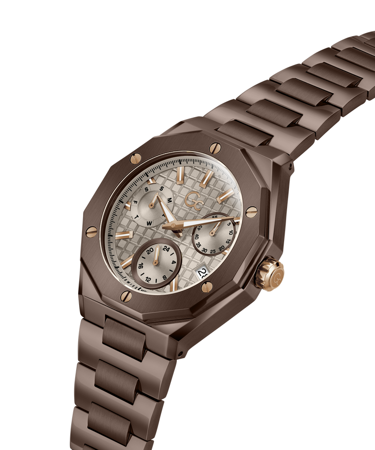 A luxury wristwatch with an octagonal dark brown gunmetal case and a matching link bracelet, featuring a textured silver-gray dial with rose gold-tone hands, markers, and subdials. lifestyle