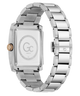 The back view of a stainless steel watch with a rectangular case and a matching metal link bracelet, featuring a brushed and polished finish. The dial is blanked out with a circular logo containing 'Gc' and 'TWENTYTHREE'.