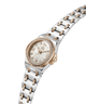 A two-tone stainless steel and rose gold watch with a mother-of-pearl dial, crystal-encrusted bezel, and matching link bracelet, shown on a plain white background. lifestyle