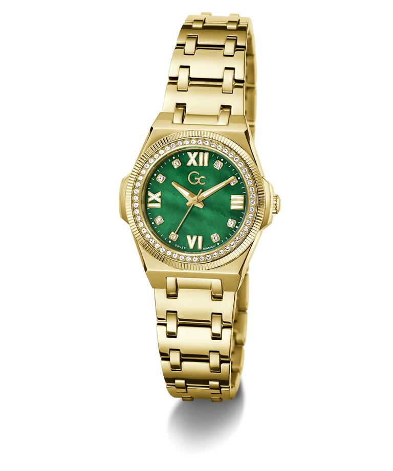 A gold-tone women's watch with a green dial, Roman numeral hour markers, a crystal-encrusted bezel, and a matching gold-tone link bracelet, shown on a white background.