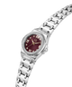 A women's analog watch featuring a silver stainless steel link bracelet, a bezel set with clear crystals, and a deep burgundy dial with gold-tone Roman numerals and hands. lifestyle