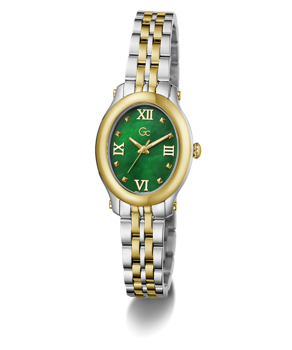 A two-tone watch with a silver and gold metal link bracelet, a gold-tone bezel, and a green dial with Roman numerals.