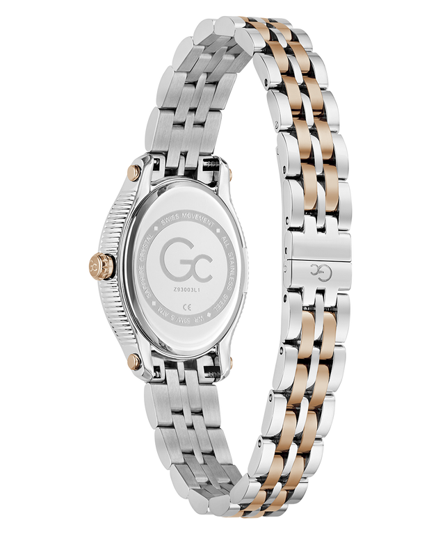 A two-tone stainless steel watch with a silver and rose gold link bracelet, shown from the back to display the case back and clasp, on a solid white background.