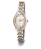 A two-tone women's analog watch with a silver and rose gold metal link bracelet, a rose gold bezel, and a white mother-of-pearl dial with Roman numerals.