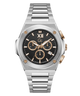 A luxury chronograph watch with a brushed silver-tone metal case and integrated link bracelet, featuring a black dial with gold-tone subdials, Roman numeral XII, and a date window.