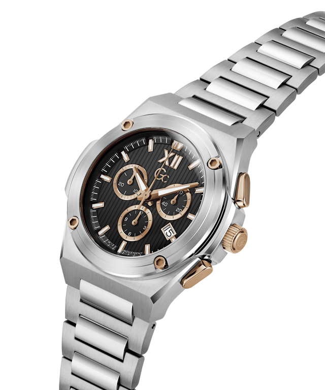 A silver stainless steel chronograph watch with a black dial, rose gold accents, and a matching silver link bracelet, shown on a clean white background. lifestyle