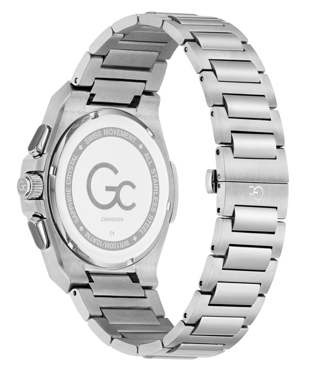 The back view of a G-Crown men's watch featuring a brushed stainless steel case and integrated link bracelet, with a gold-tone crown and pushers.