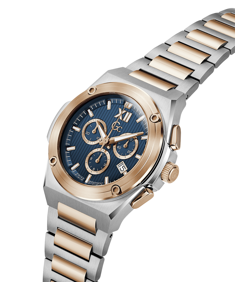A men's two-tone stainless steel and rose gold chronograph watch with a blue dial, shown on a clean white background. lifestyle