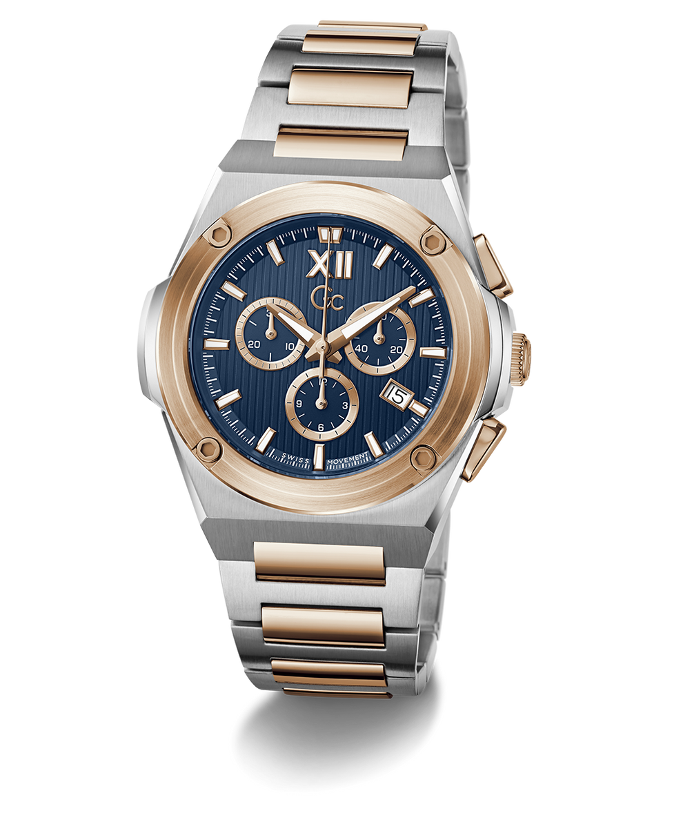 A two-tone stainless steel and rose gold chronograph watch with a blue dial, featuring Roman numeral XII on the watch face and a date window at 3 o'clock, set against a plain white background.