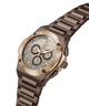 A men's chronograph watch with a dark brown ceramic or composite metal link bracelet, a rose gold-toned bezel, and a silver-toned dial with multiple subdials. lifestyle