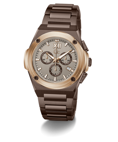 A luxury chronograph watch featuring a dark brown ceramic or titanium case and link bracelet, a rose gold-toned bezel, and a textured light gray dial with brown subdials.
