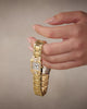 video of hand holding Taylor watch in different colors